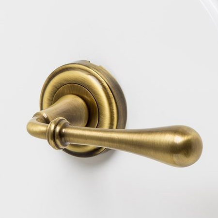 Heritage Brass Brass Handles on a Round Rose