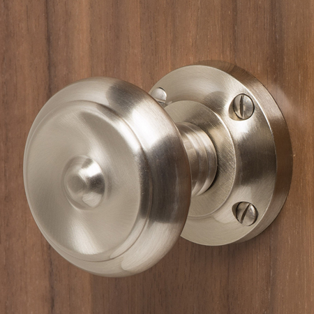 Heritage Brass Silver Door Knobs on a Rose